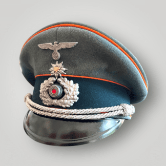 A rare Feldgendarmerie Visor cap Gebirgsjäger division. The visor cap is constructed with grey-green felted doeskin with three bands of orange pipping for Feldgendarmerie units with dark green woollen band for Army/Heer and braided wire chin cord for officers.