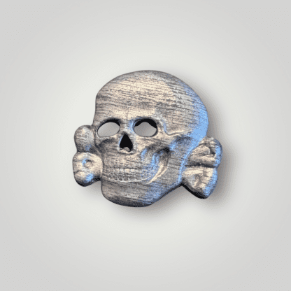 A late war Waffen-SS visor cap skull by Assmann, die stamped construction in silvered zink.