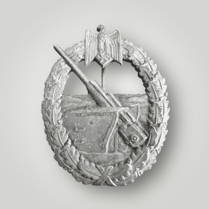 An original WW2 Kriegsmarine Coastal Artillery badge by Steinhauer & Lück, constructed in zinc mid to late war. 