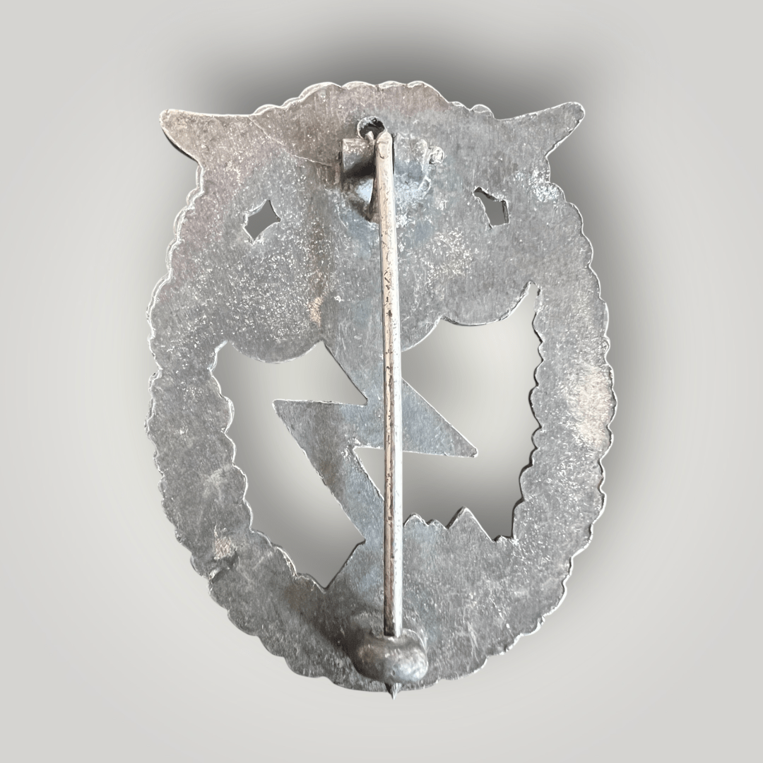 Reverse image of a late war Luftwaffe Ground Assault Badge by Arno Wallpach, constructed in Zinc.