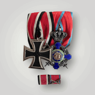 A German WW2 & Romanian Medal Group Court Mounted with an Iron Cross Ek2 and The Order of the Star of Romania, Knight, Type 2, with medal bar.