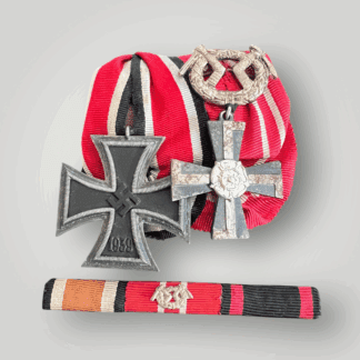 A German WW2 Iron Cross & Finnish Cross Court Mounted, with Ribbon Bar. This court mounted medal group is seldom encountered together. The first medal is a German WWII Iron Cross 2nd Class, unmarked with magnetic iron core.