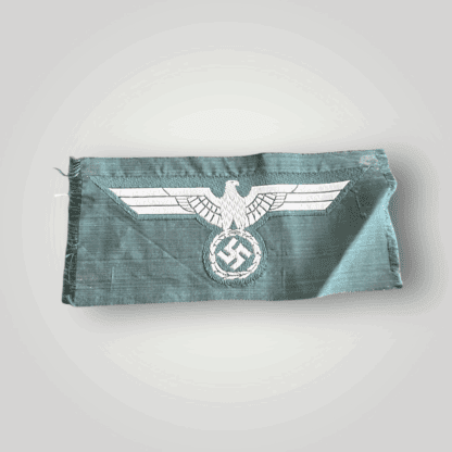 An original German WW2 Heer (Army) M38 Bevo breast eagle, flat weave BeVo construction on field green backing.