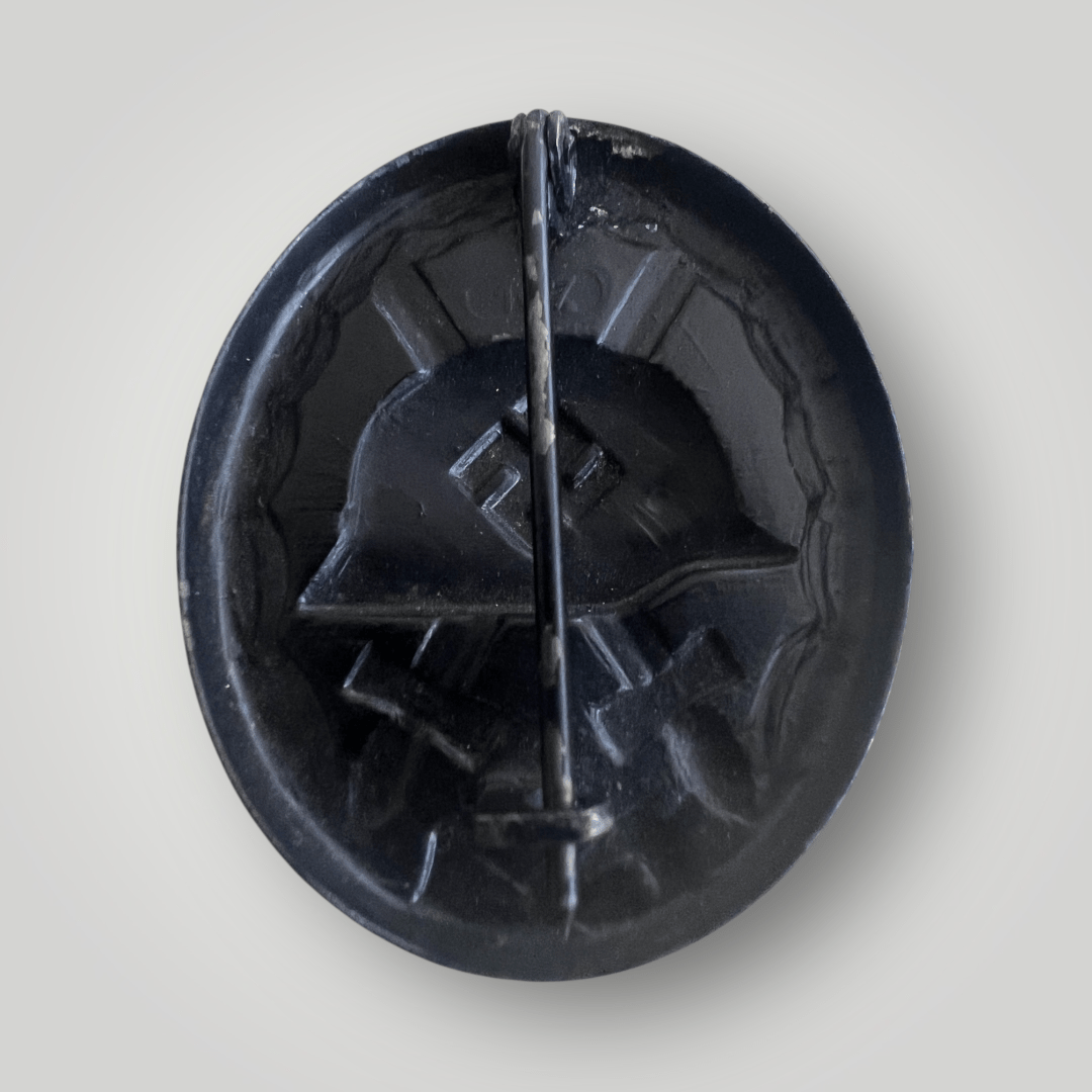 Reverse image of a German WW2 Wound Badge in Black by Carl Wild.