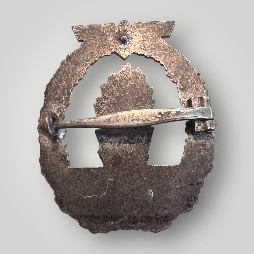 Reverse image of an original German WW2 Kriegsmarine Minesweepers Badge by Wilhelm.