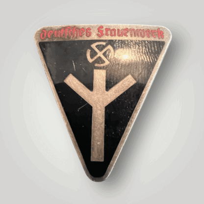 A National Socialist Frauenschaft Enamel Badge (Nationalsozialistische Frauenschaft Mitgliedsabzeichen) constructed in bronze with with multi-coloured enamels.