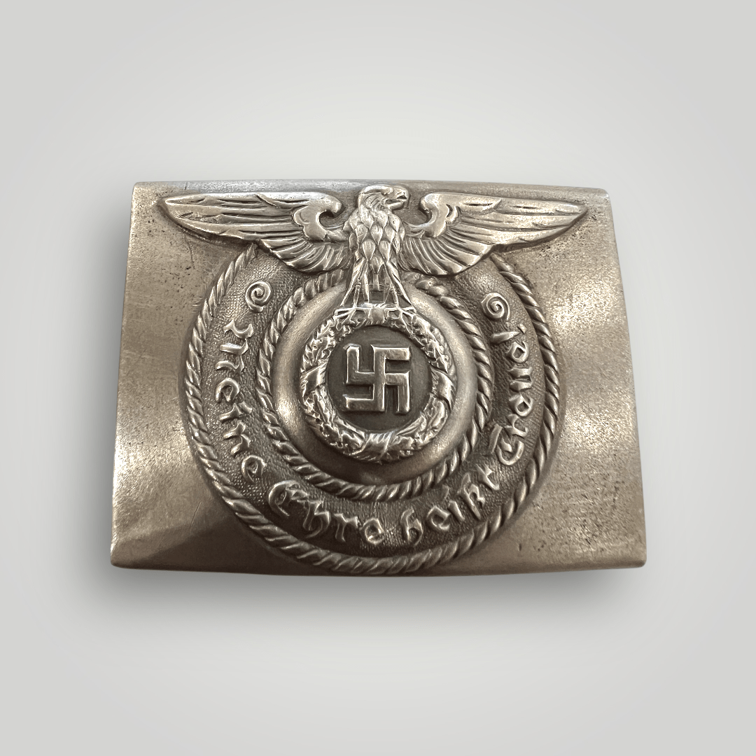 This is an early example of a rare Waffen-SS EM/NCOs belt buckle hammer-head variant, die struck in silver nickel circa 1931 - 1936.
