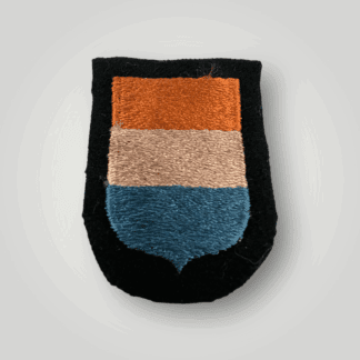 An original Waffen-SS Dutch Volunteer sleeve shield, machine embroidered with the Dutch national colours orange, white, and royal blue on wool.