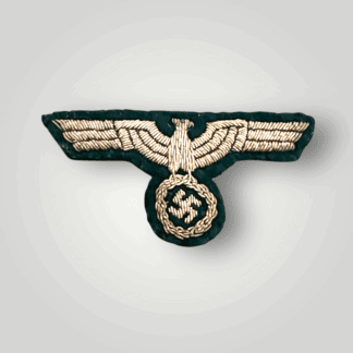 A Kriegsmarine Coastel Artillery Officer's bullion breast eagle,  constructed with gold bullion thread on light green woollen backing.