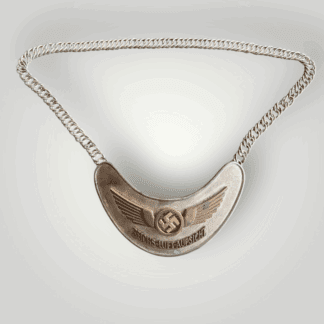 An early Luftwaffe Air Traffic Controller’s Gorget 1st Pattern, constructed in nickel and brass, complete with original chain.