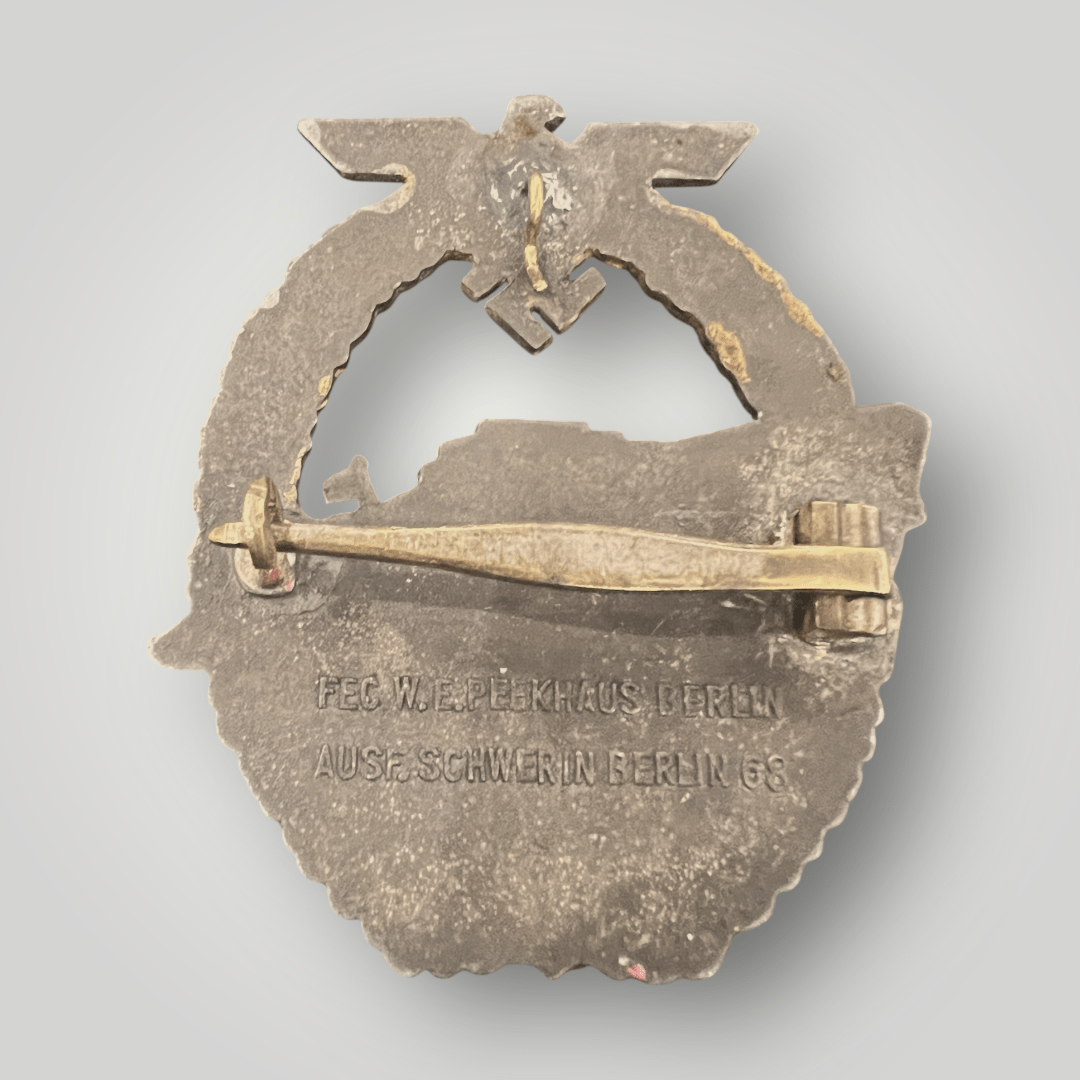 Reverse image of a Kriegsmarine Eboat Badge by Schwerin, Berlin 2nd pattern.