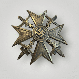An original German Spanish Cross Bronze with swords by Petz & Lorenz, constructed in bronze. The obverse of the decoration depicts a Maltese Cross with pebbled arms. In between the arms are cross swords denoting combat service superimposed by a Luftwaffe style eagle clutching a swastika.