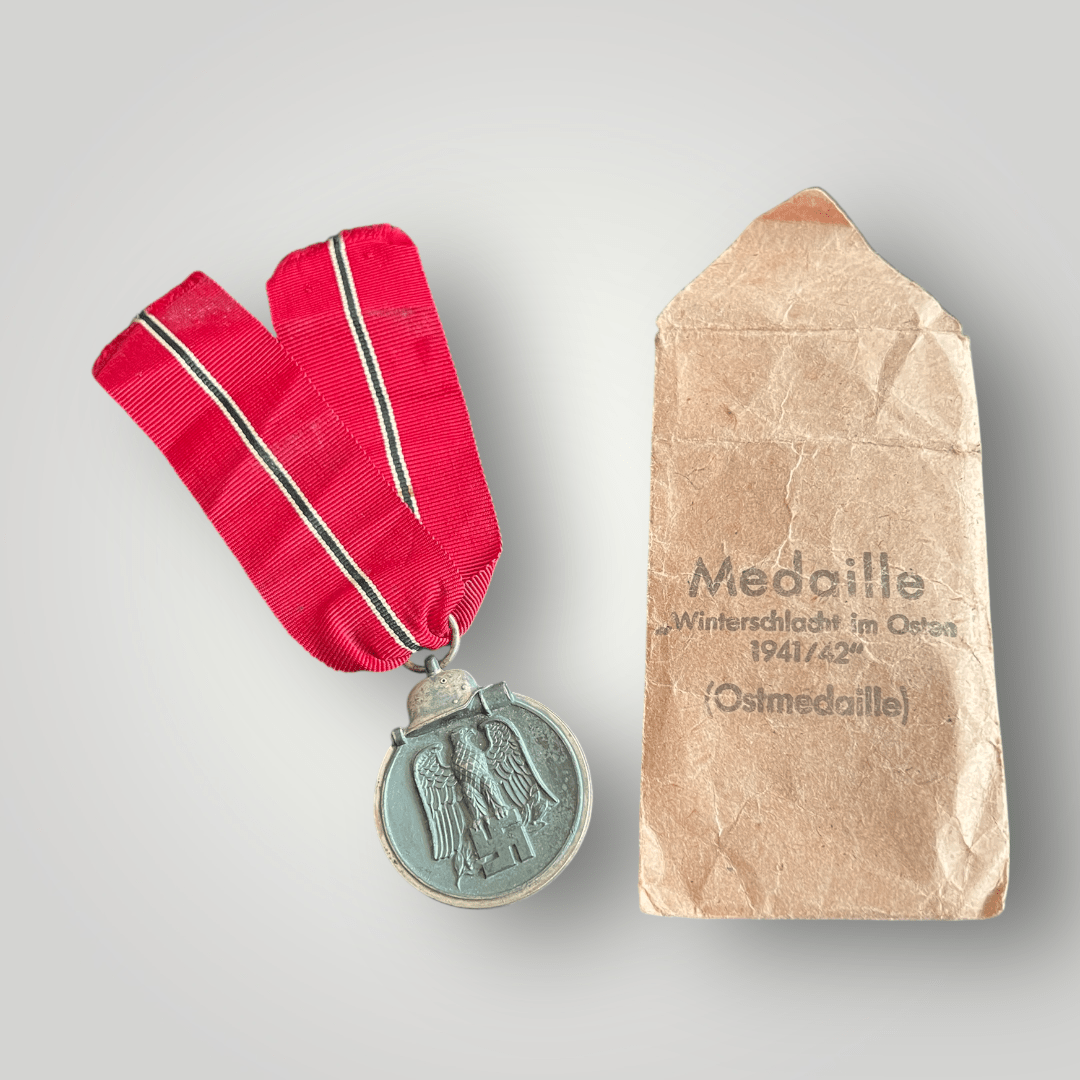 An Eastern Front Medal by Deschler & Sohn, constructed in zinc complete with ribbon and presentation packet.
