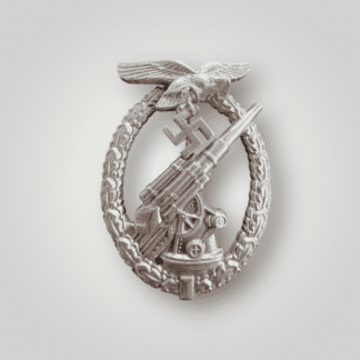 An early Luftwaffe Flak Badge by Brehmer Markneukirchen, constructed in nickle. The obverse of the badge has very nice patina with original finish.The reverse of the decoration has the makers mark "BREHMER, MARKNEUKIRCHEN” and includes a barrel hinge with vertical pinback and flat wire catch.