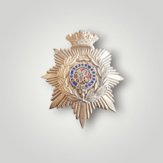 A Victorian Royal Military College Sandhurst Officer cadet helmet plate 1837-1901, die-stamped construction in brass and enamel