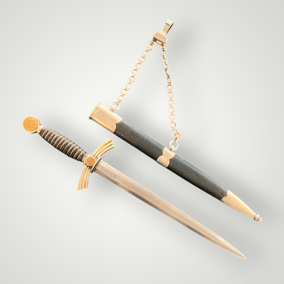 This is an early example of a Luftwaffe Dress Dagger 1st Model by Hörster Solingen. The nickel-plated blade remains in excellent condition and features the E. & F. Hörster Solingen logo, acid-etched on the ricasso.