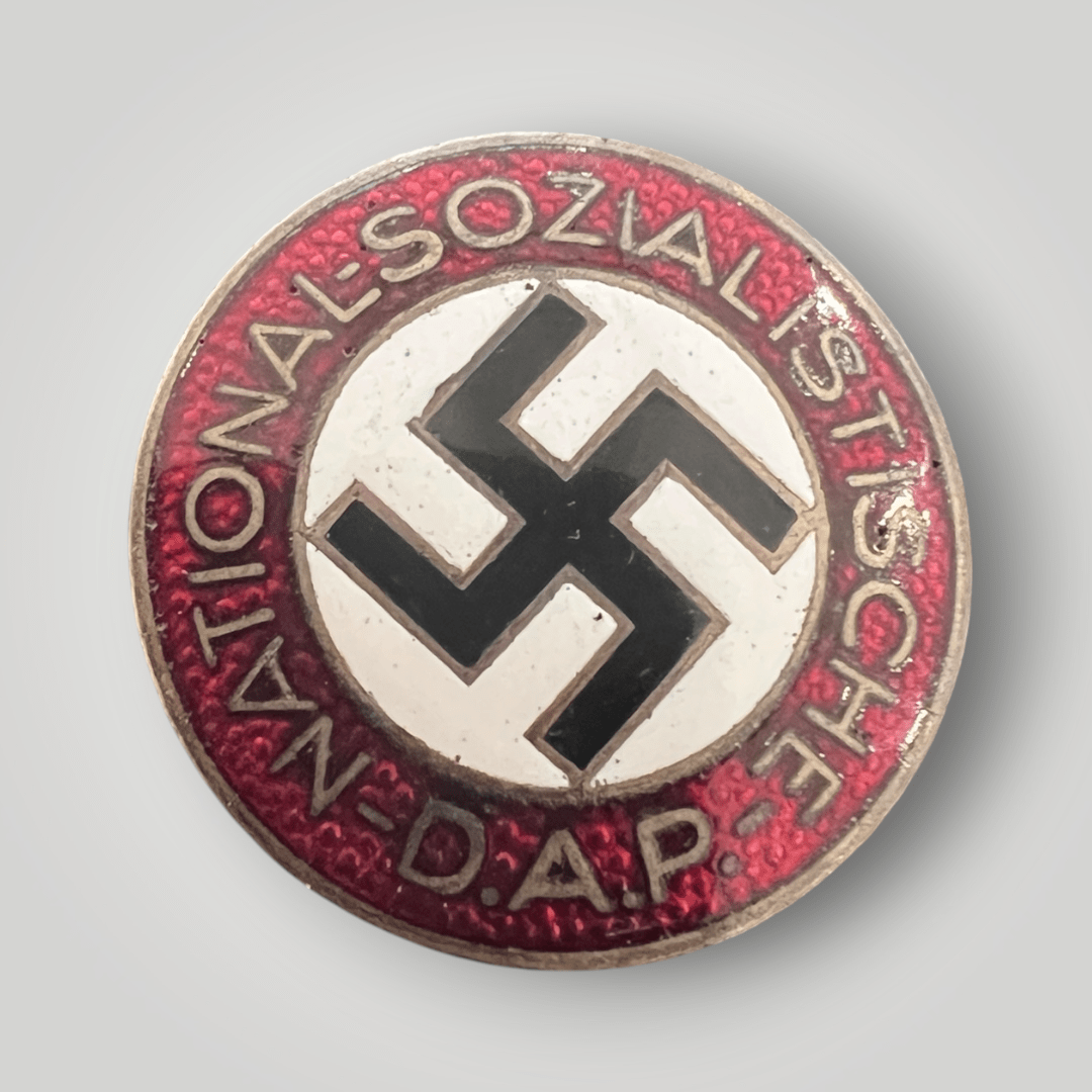 An original NSDAP Party Badge button hole by Fritz Zimmermann, constructed in white, red, black, and gold enamel.