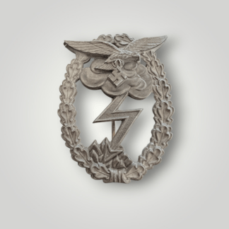 An original Ground Assault Badge By G.H. Osang, two-part construction with riveted eagle, in silvered tombac.