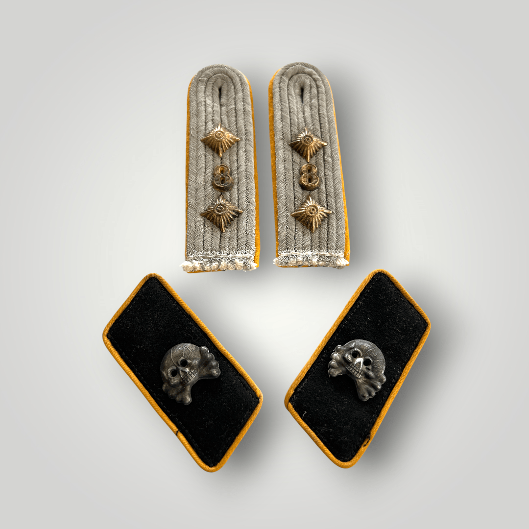A rare Heer Panzer Reconnaissance, Battalion 8 insignia group. The group includes a set of shoulder boards and collar boards.