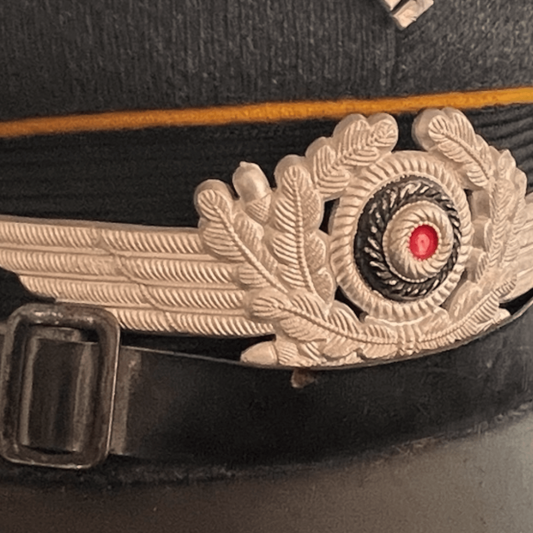 An original NSDAP Long Service Medal 10 Years with presentation box, constructed in zinc with original ribbon. The obverse of the medal has a beautiful bronze finish with nice patina, and the suspension ring is unmarked.