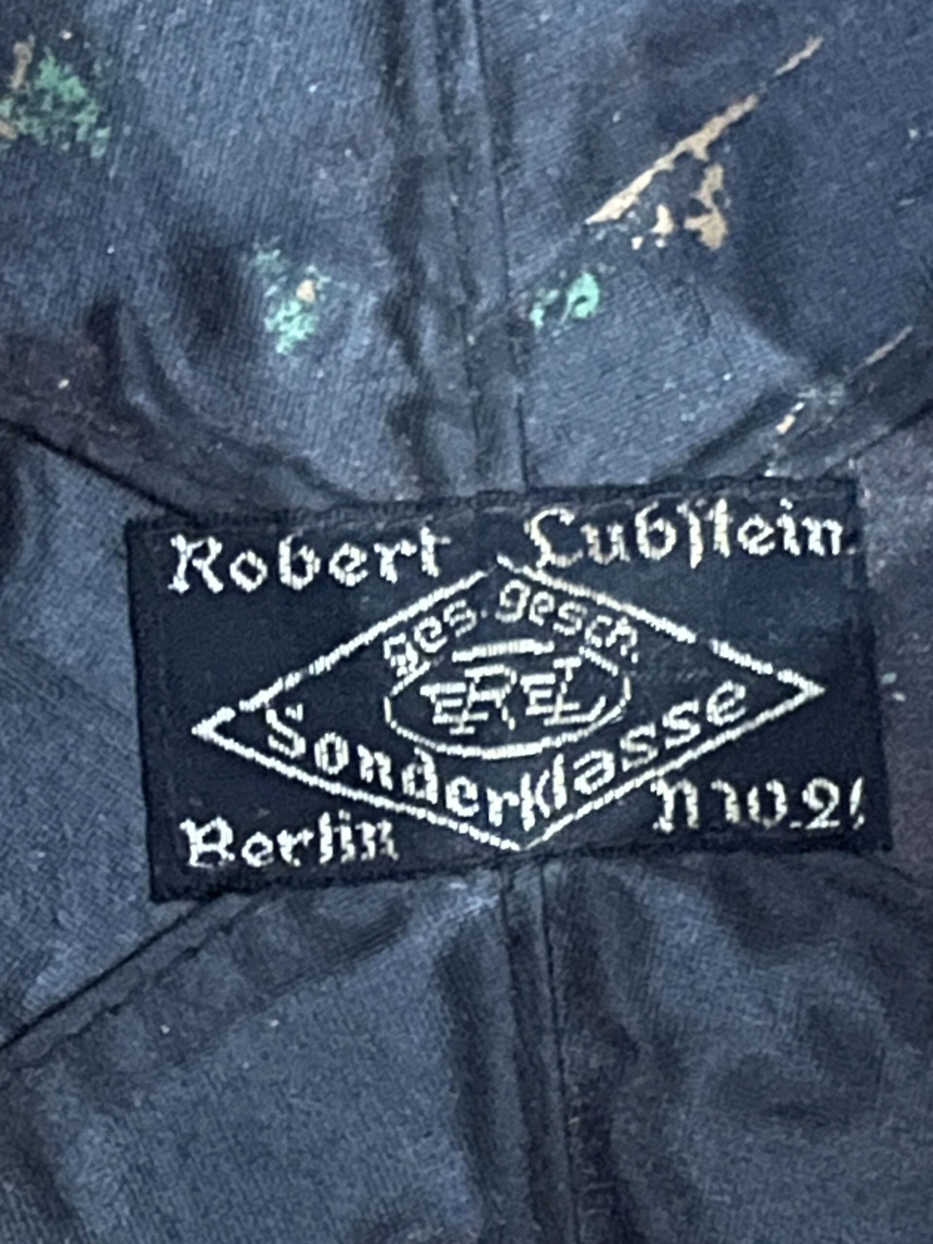 A close up image of the EREL lable for a German WW2 Gendarmerie Police Motorcycle Helmet.