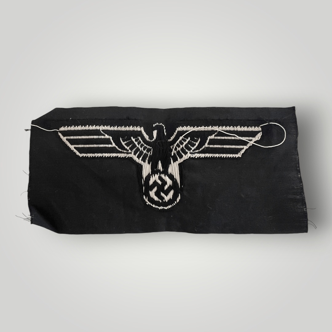 Reverse image of an original German WW2 Heer Panzer Krim Campaign Shield, magnetic version with bronze finish with beautiful patina, mounted on black woollen backing.