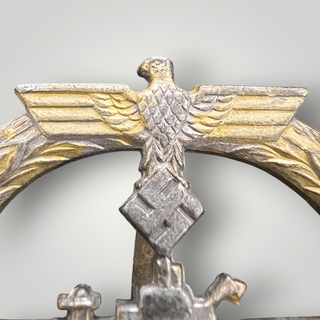 An original Kriegsmarine U-Boat badge by Funcke & Brunenghaus, mid to late war, constructed in zinc.