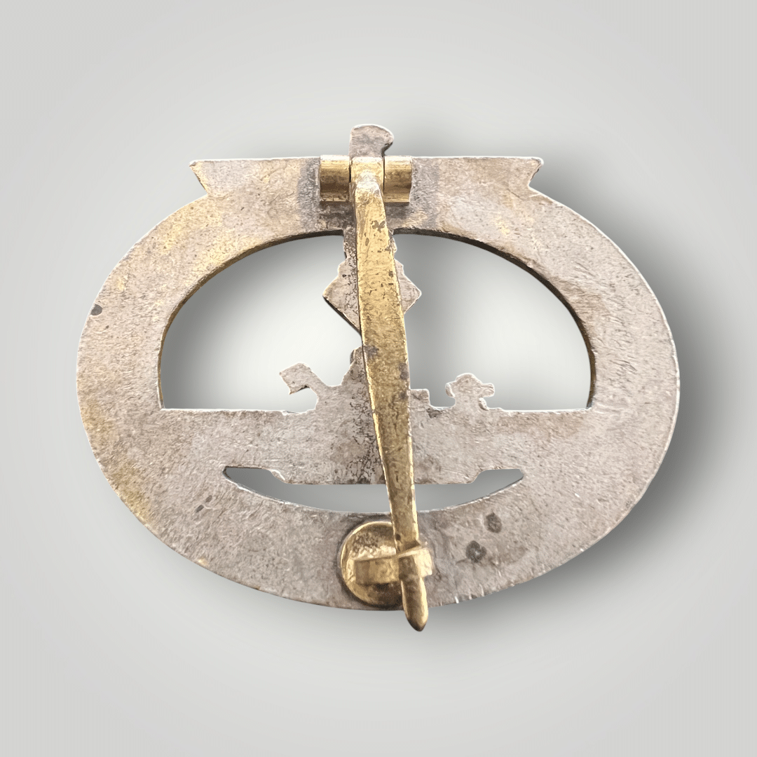 Reverse image of a original Kriegsmarine U-Boat badge by Funcke & Brunenghaus. The decoration is mid to late war, constructed in zinc.
