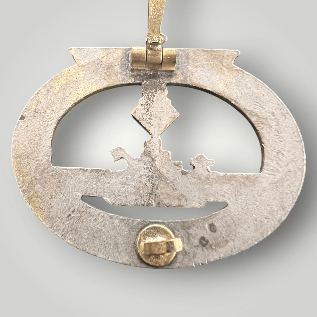 Reverse image of a original Kriegsmarine U-Boat badge by Funcke & Brunenghaus. The decoration is mid to late war, constructed in zinc.