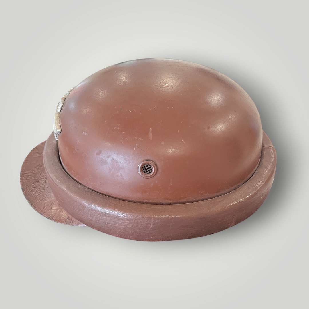 A genuine German WW2 Gendarmerie Police Motorcycle Helmet by Erel, constructed in fibreglass and brown leather.