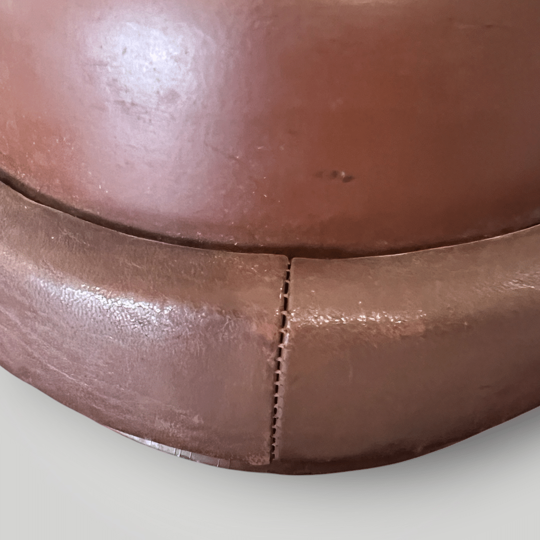 A genuine German WW2 Gendarmerie Police Motorcycle Helmet by Erel, constructed in fibreglass and brown leather.