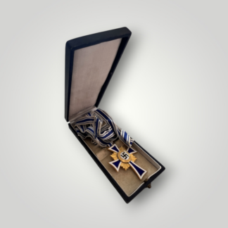 An original German Mother’s Cross in Gold, manufactured by Ziemer & Söhne and accompanied by its original presentation case.