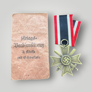 An original German WW2 War Merit Cross With Swords 2nd Class by Frank & Reif, complete with presentation packet.