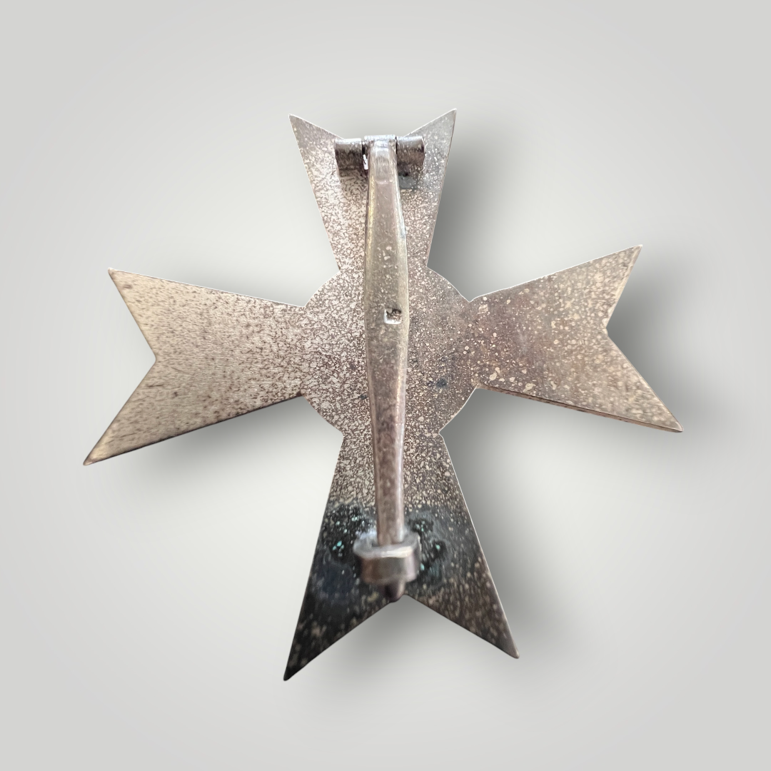 Reverse War Merit Cross, 1st Class without Swords by Foerster & Barth, constructed in silvered tombac.