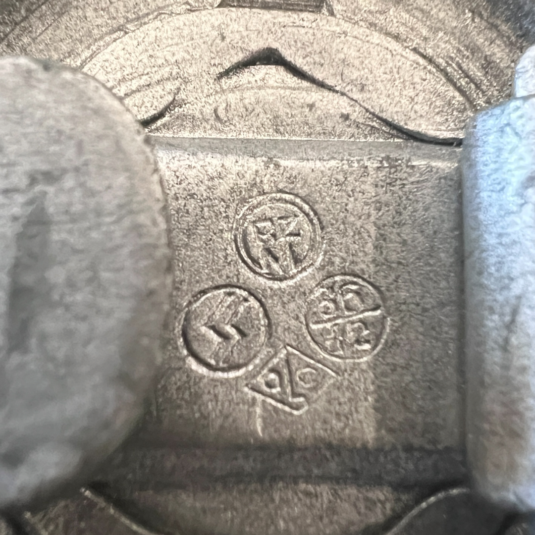 Reverse image of a Waffen-SS Officer’s Belt Buckle stamped SS RZM 36/42 OLC for verhoff and Cie of Lüdenscheid, manufactured in 1942.