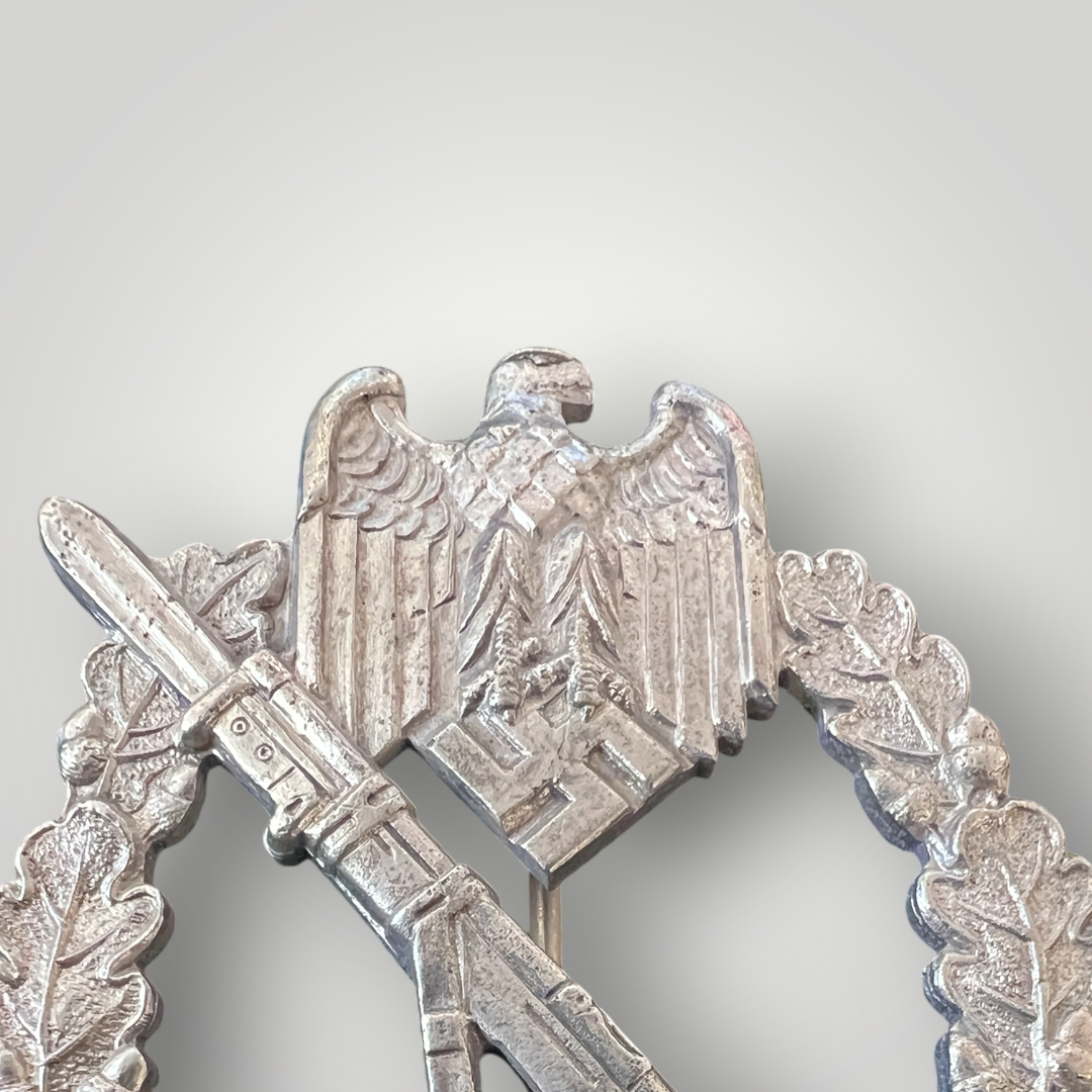 An original German WW2 Infantry Assault Badge by Paul Meybauer, constructed from silver-plated zinc.