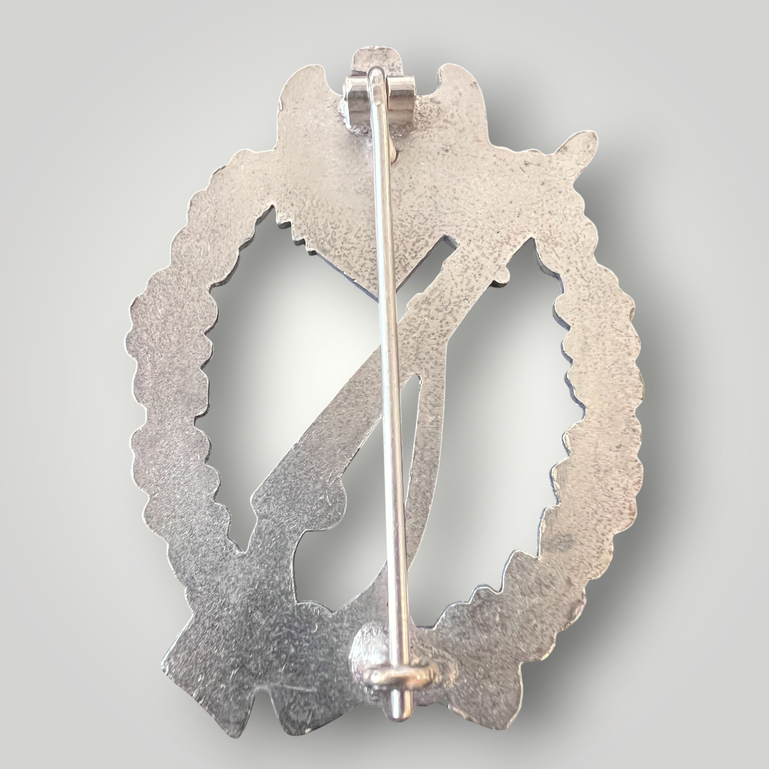 Reverse image of an original German WW2 Infantry Assault Badge by Paul Meybauer, constructed from silver-plated zinc.